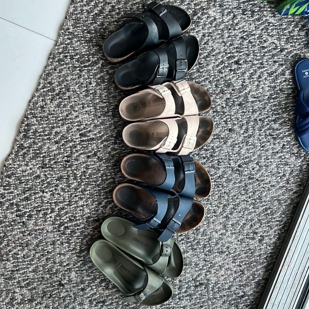 3 pairs of Birkenstock Arizona sandals and 1 Birkenstock Eva
